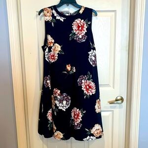 Sleeveless, trapeze dress – virtually brand new!